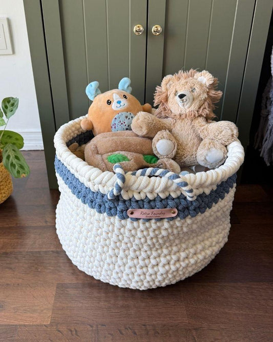 White woven basket on a wooden floor next to a green cabinet, Blue Off White
