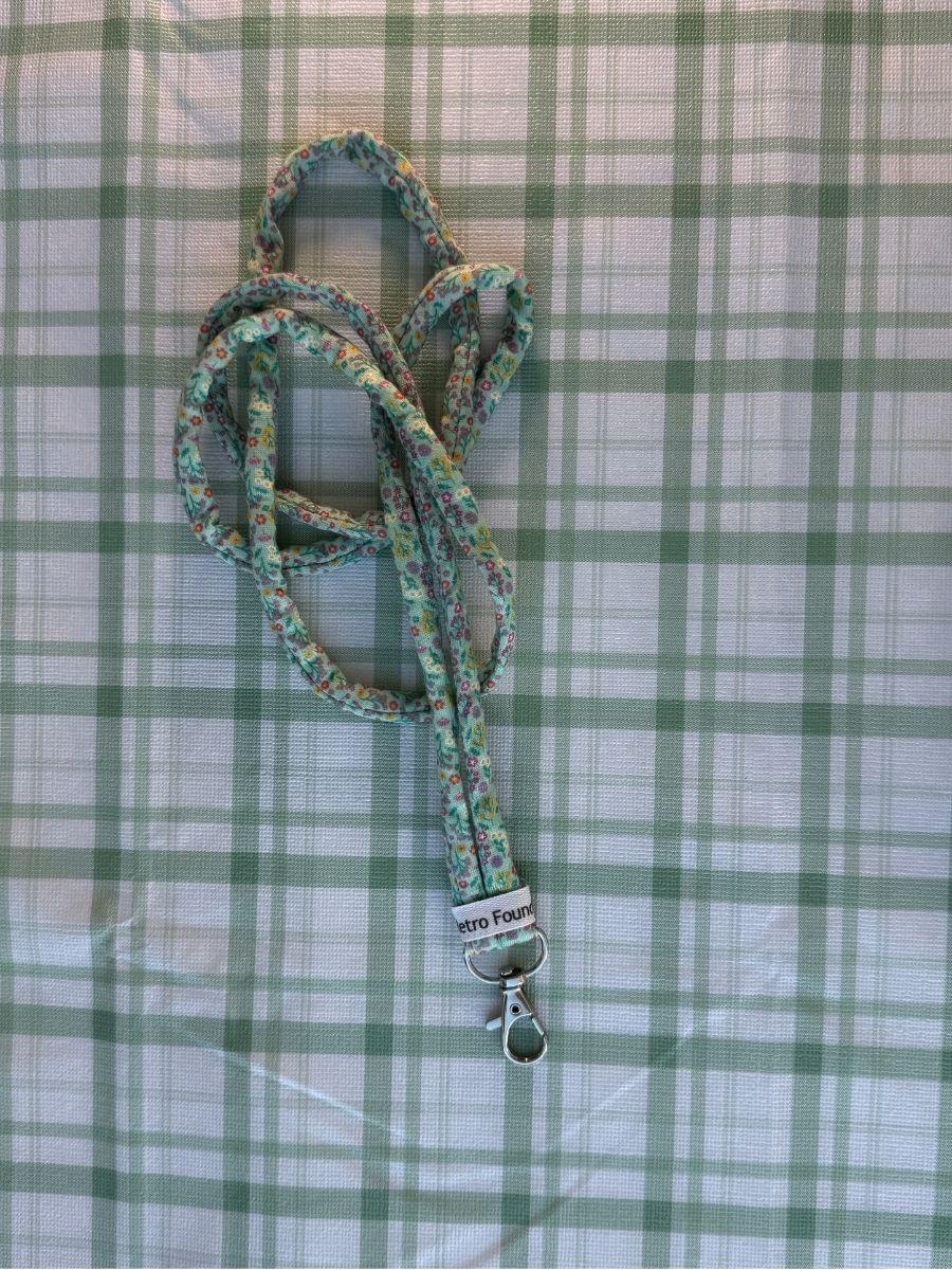 Floral Print on Teal Fabric