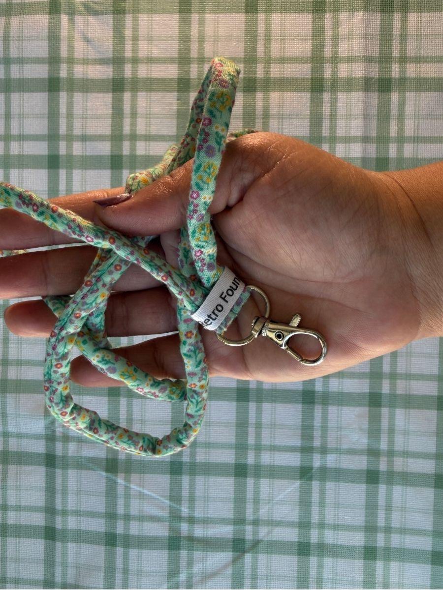 Floral Print on Teal Fabric