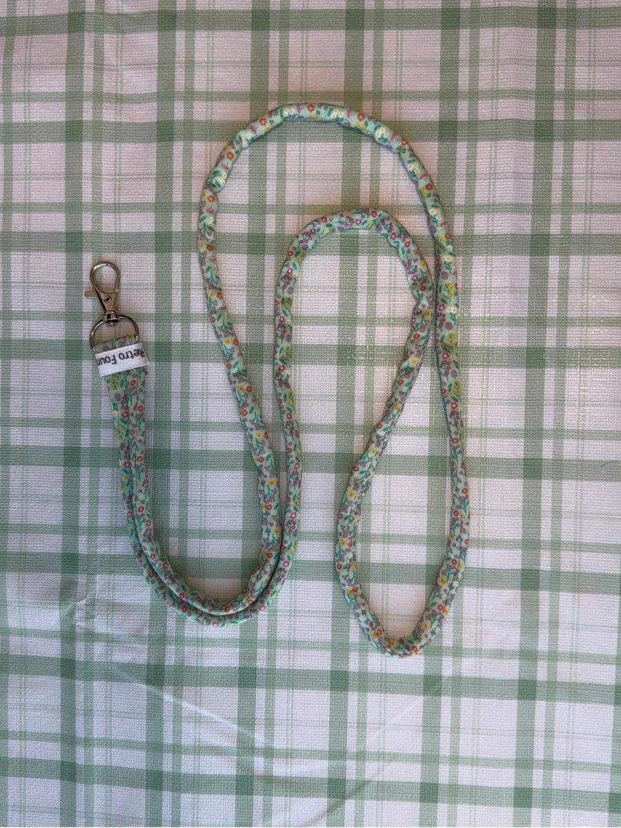 Floral Print on Teal Fabric