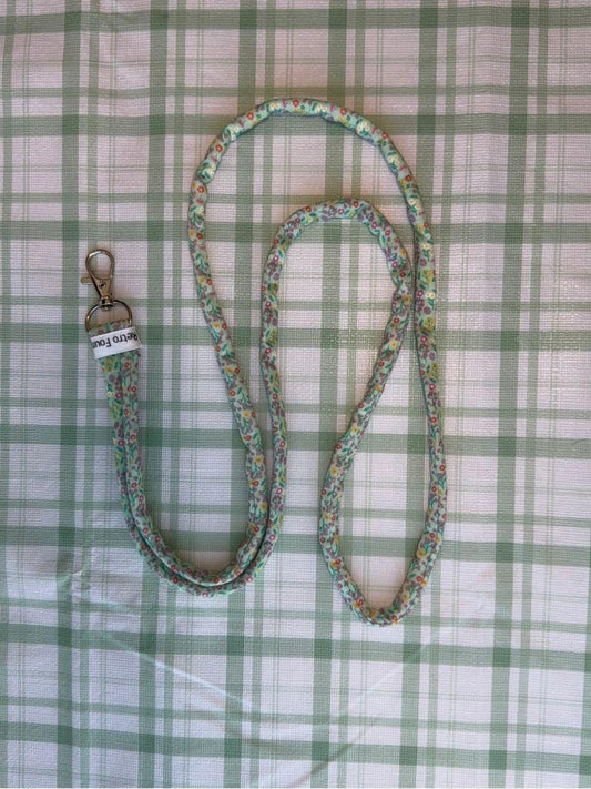 Floral Print on Teal Fabric