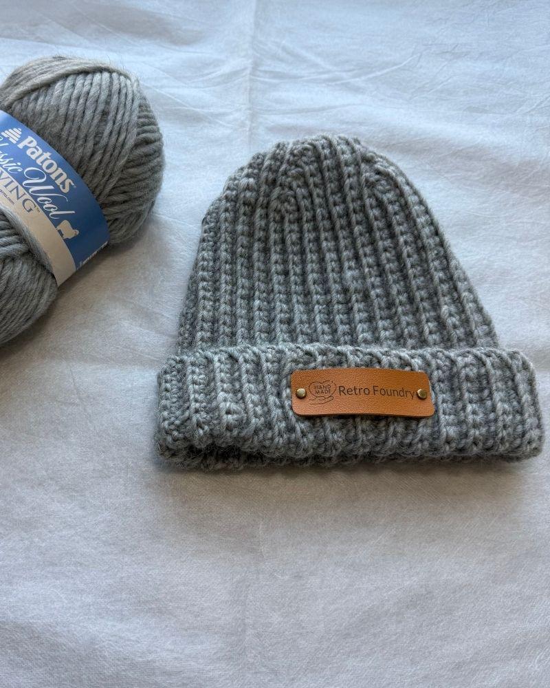 Handmade beanie with a leather patch labeled 'Retro Foundry', Gray