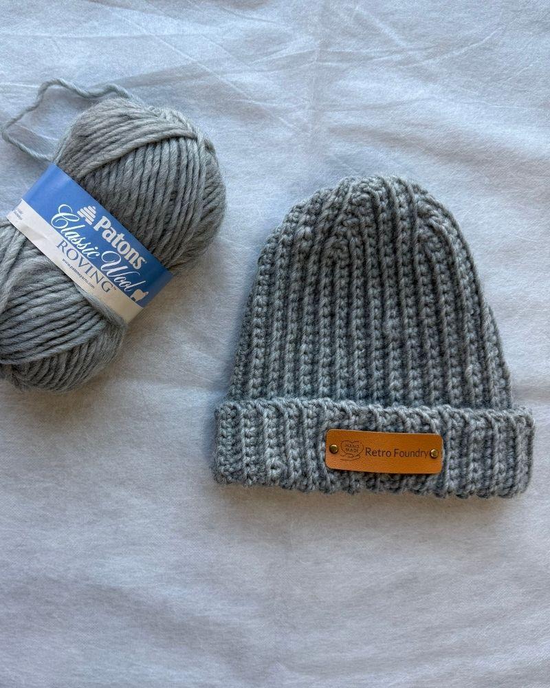 Handmade beanie with a leather patch labeled 'Retro Foundry', Gray